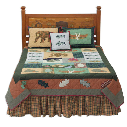 Quilted Cabin Quilt, Hand cut and Appliqued cotton fabric motifs.