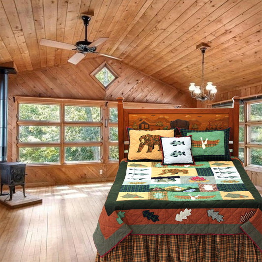 Quilted Cabin Quilt, Hand cut and Appliqued cotton fabric motifs.