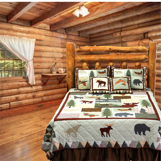 White Mountain Whispers Quilt, Hand cut and Appliqued cotton fabric motifs.