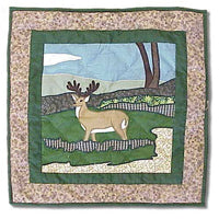 American Wilderness Quilt, Hand cut and Appliqued cotton fabric motifs.
