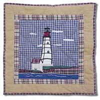 Lighthouse Canvas  Quilt, Hand cut and Appliqued cotton fabric motifs.